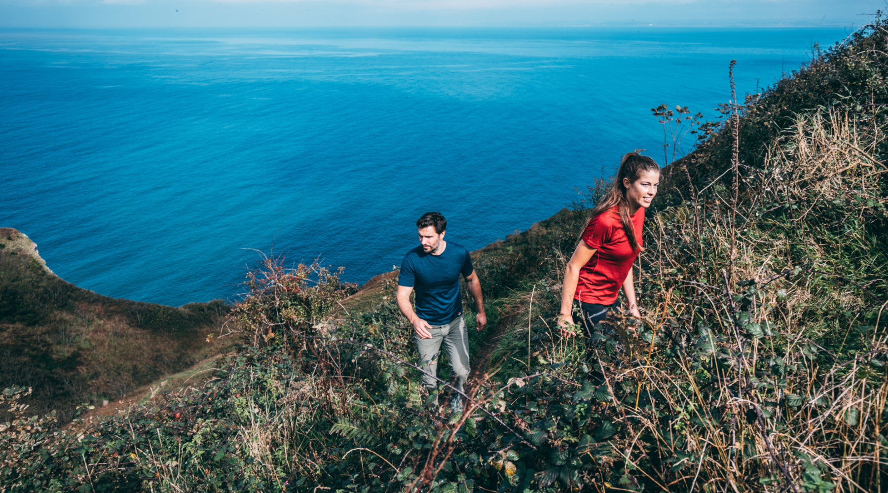 Isobaa Merino Short Sleeve Tops worn on a sunny cliff walk