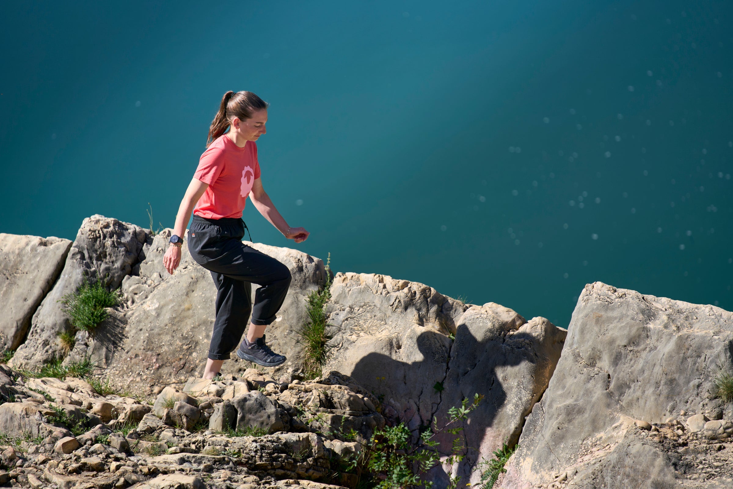 Person hiking on rocky terrain