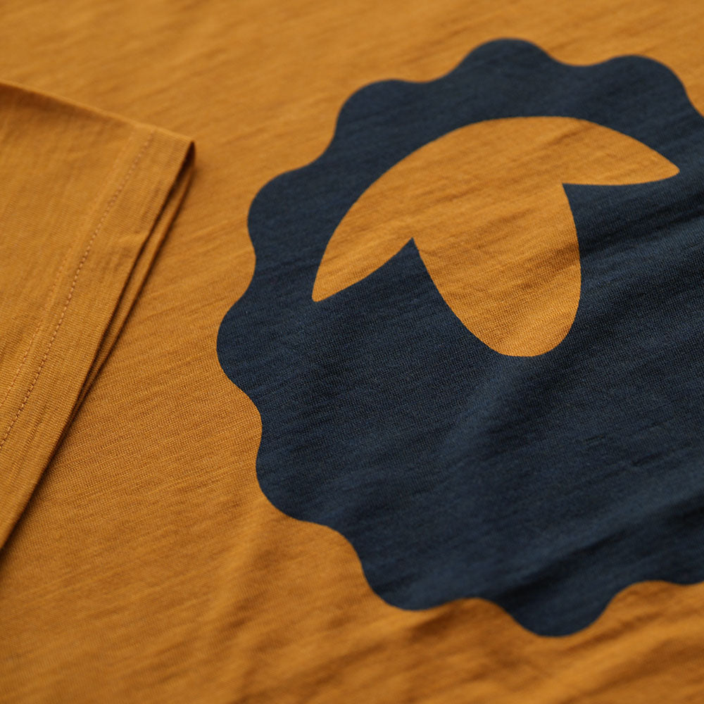 Isobaa | Mens Merino 150 Emblem Tee (Mustard/Navy) | Conquer trails and city streets in comfort with Isobaa's superfine Merino T-Shirt.