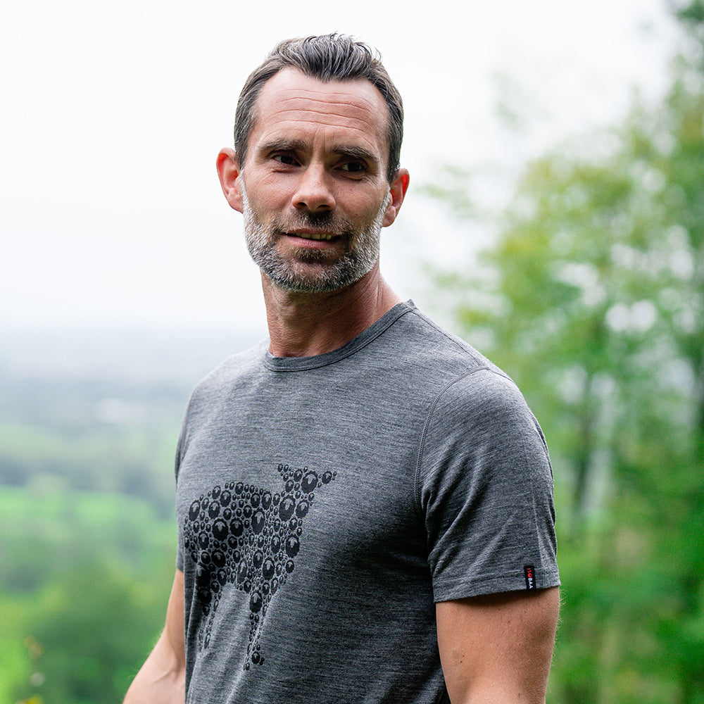 Isobaa | Mens Merino 150 Sheep Tee (Smoke/Black) | Gear up for everyday adventures in Isobaa's superfine Merino Tee. | Model: Ben
