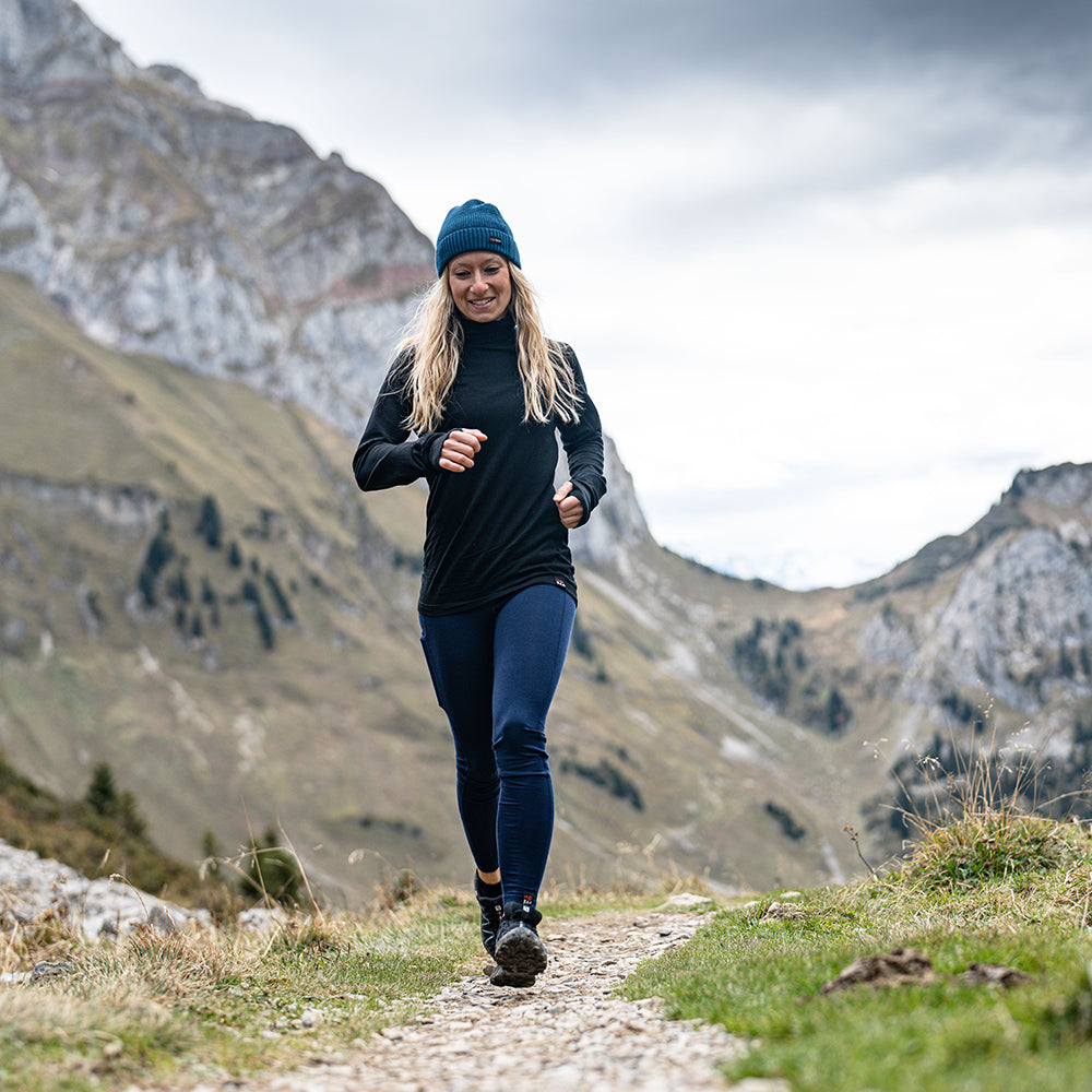 Isobaa | Womens 160 Merino Active Roll Neck (Black) | Embrace the chill in style with our Women's 160 Merino Active Roll Neck, crafted from 160g 18.5 micron superfine merino wool | Model: Estelle