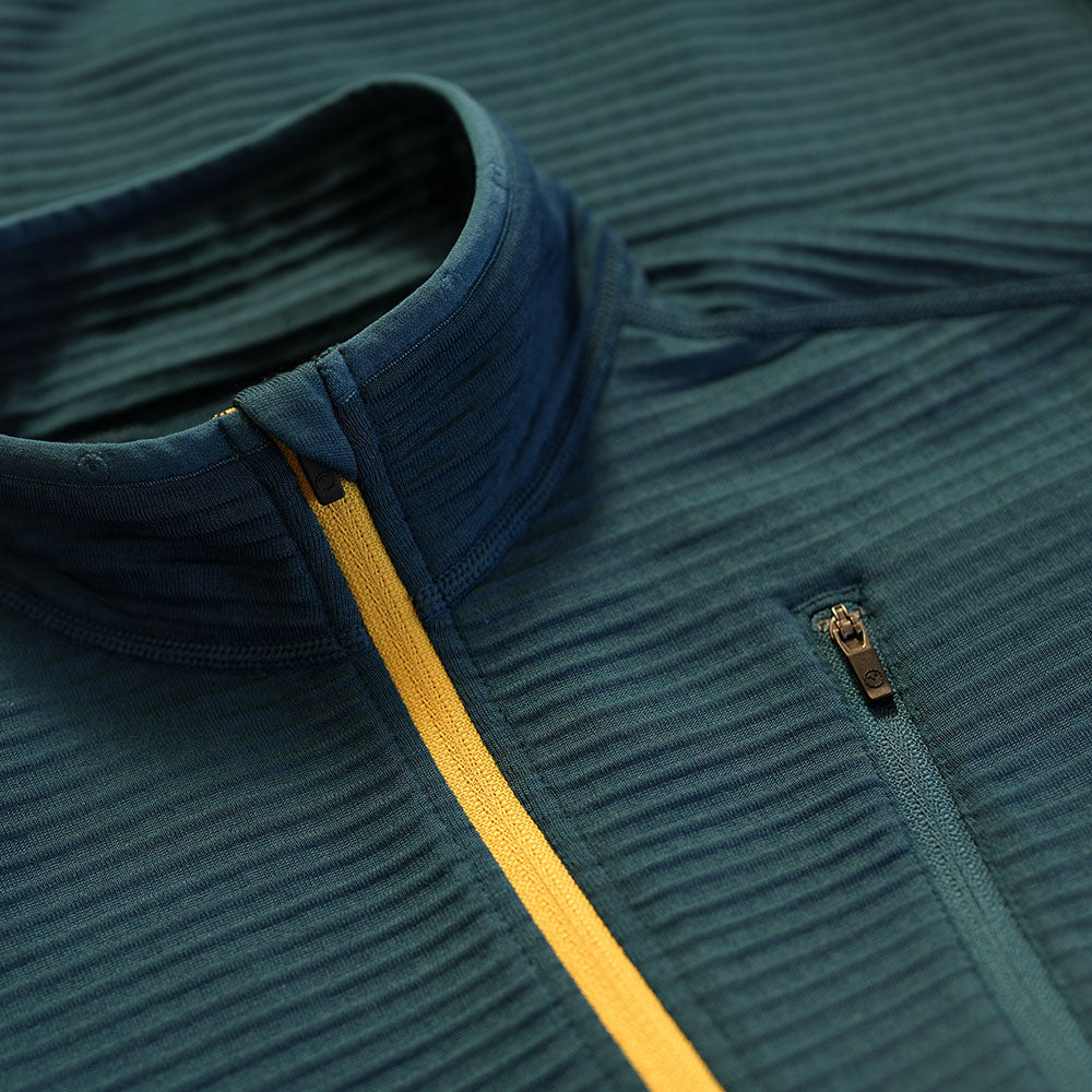 Isobaa | Womens 260 Merino Blend Grid Fleece (Petrol) | Stay warm and comfortable during your cold-weather activities with the 260 Merino Blend Grid Fleece Half Zip