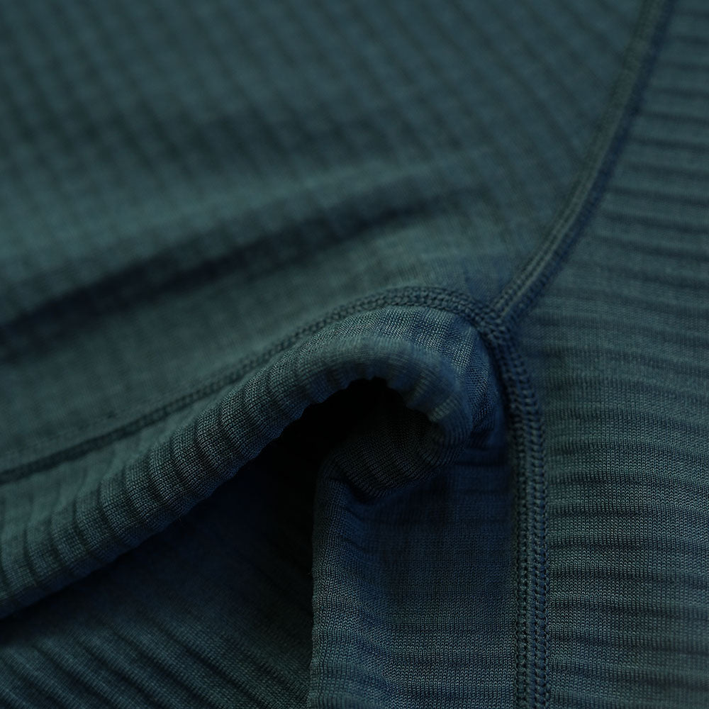 Isobaa | Womens 260 Merino Blend Grid Fleece (Petrol) | Stay warm and comfortable during your cold-weather activities with the 260 Merino Blend Grid Fleece Half Zip