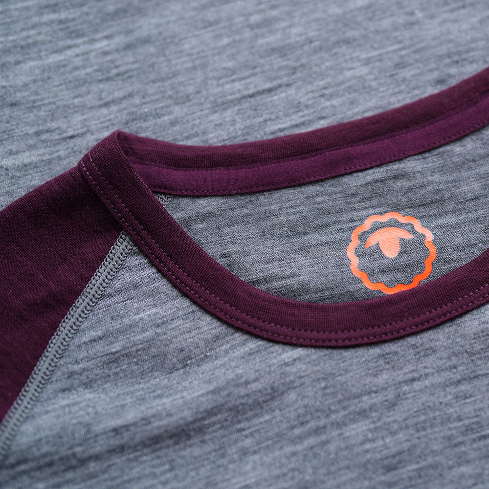 Isobaa | Womens Merino 150 Raglan Baseball Tee (Charcoal/Wine) | Layer for adventure with Isobaa's superfine Merino Tee.