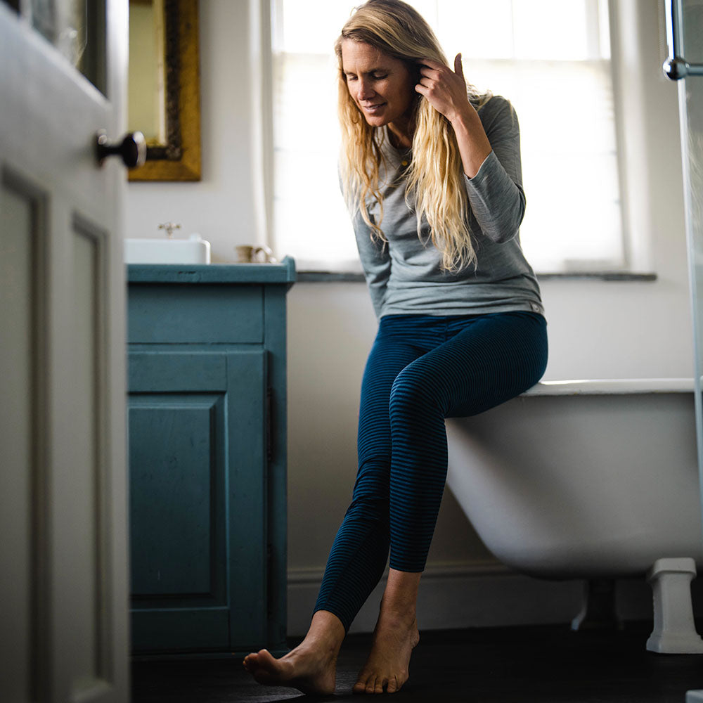 Isobaa | Womens Merino 200 Tights (Navy/Denim) | Conquer mountains, ski slopes, and sofa days with unmatched comfort in our 200gm Merino wool tights. | Model: Amy