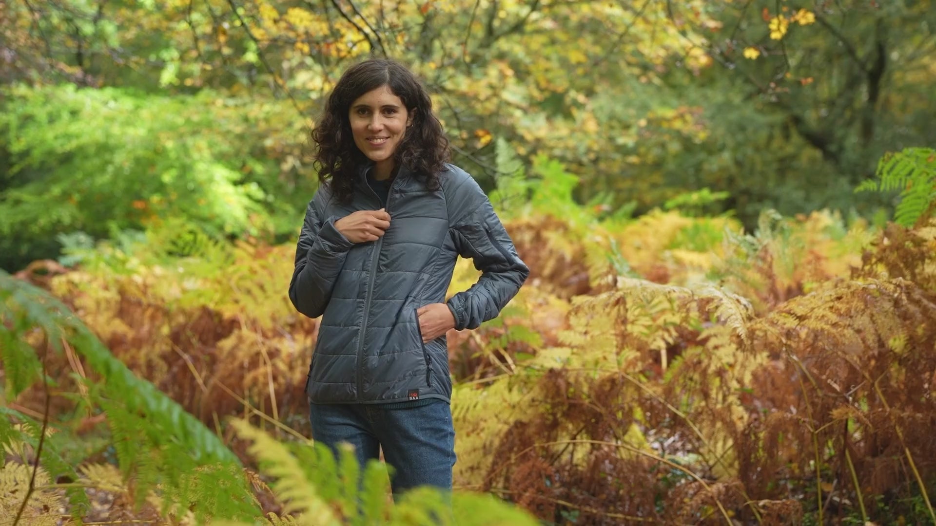 Isobaa | Womens Packable Insulated Jacket (Denim/Navy) | Exceptional warmth, packable convenience, and sustainable design with our lightweight Merino wool jacket. | align: 50% 45% | Model: Clémentine