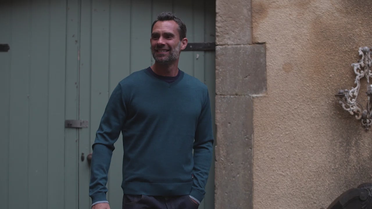 Isobaa | Mens Merino V Neck Sweater (Petrol/Sky) | Stay comfortable on the go with our V-neck sweater crafted from superfine Merino wool. | align: 45% 50% | Model: Ben