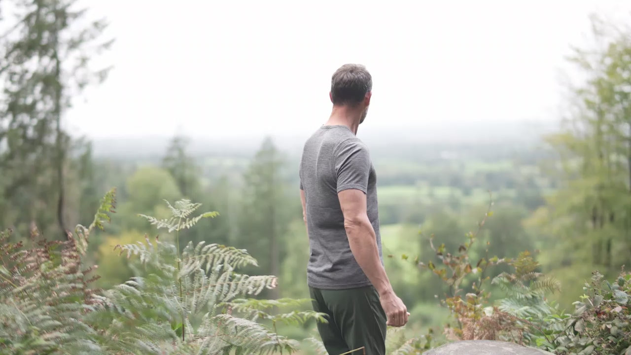 Isobaa | Mens Merino 150 Sheep Tee (Smoke/Black) | Gear up for everyday adventures in Isobaa's superfine Merino Tee. | align: 65% 50% | Model: Ben
