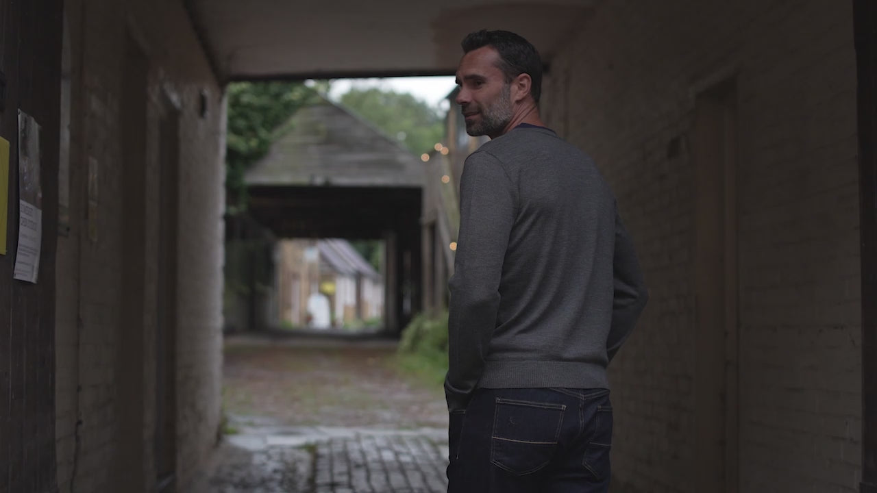 Isobaa | Mens Merino V Neck Sweater (Smoke/Charcoal) | Stay comfortable on the go with our V-neck sweater crafted from superfine Merino wool. | align: 45% 50% | Model: Ben