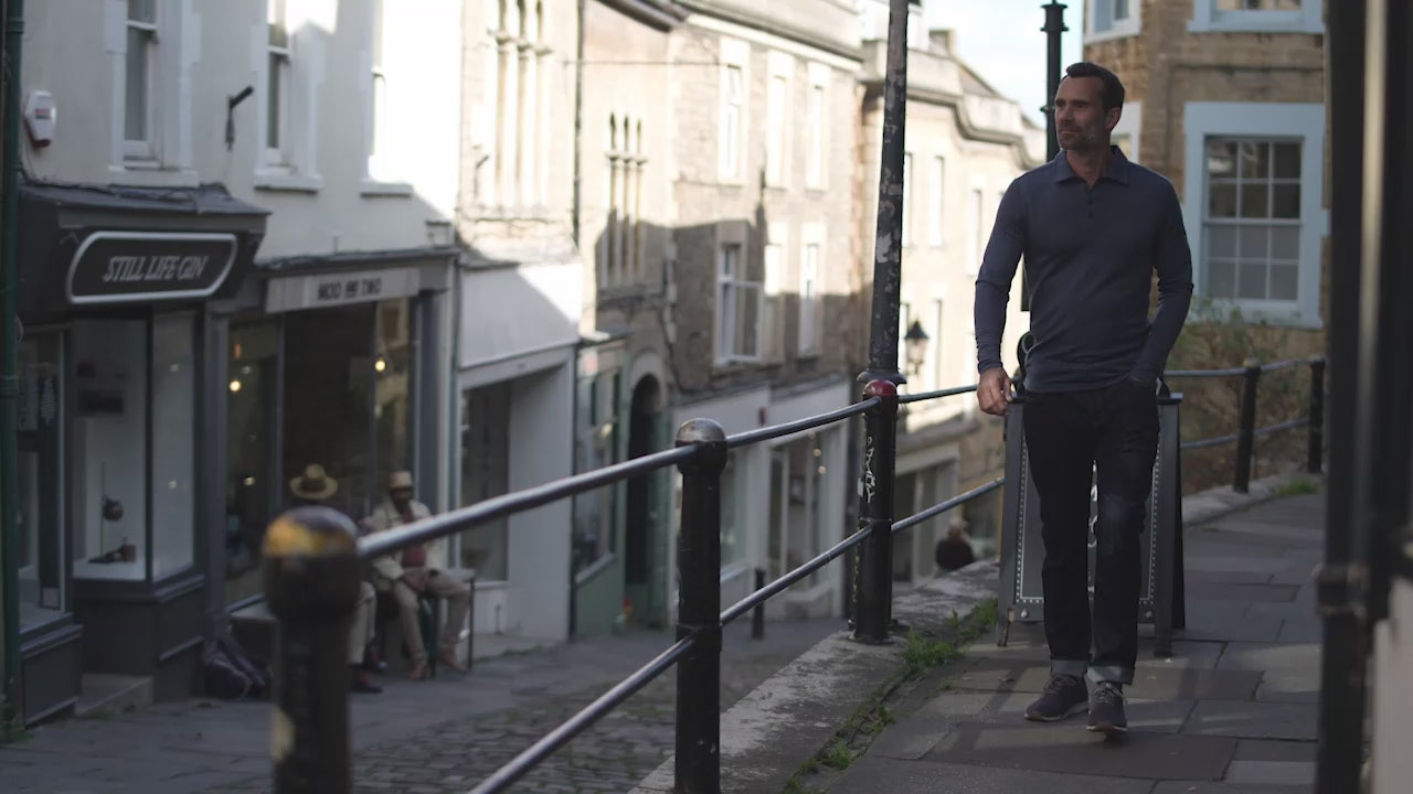 Isobaa | Mens Merino 200 Long Sleeve Polo Shirt (Denim/Navy) | Discover unmatched comfort with our 200gm Merino wool polo. | align: 85% 50% | Model: Ben
