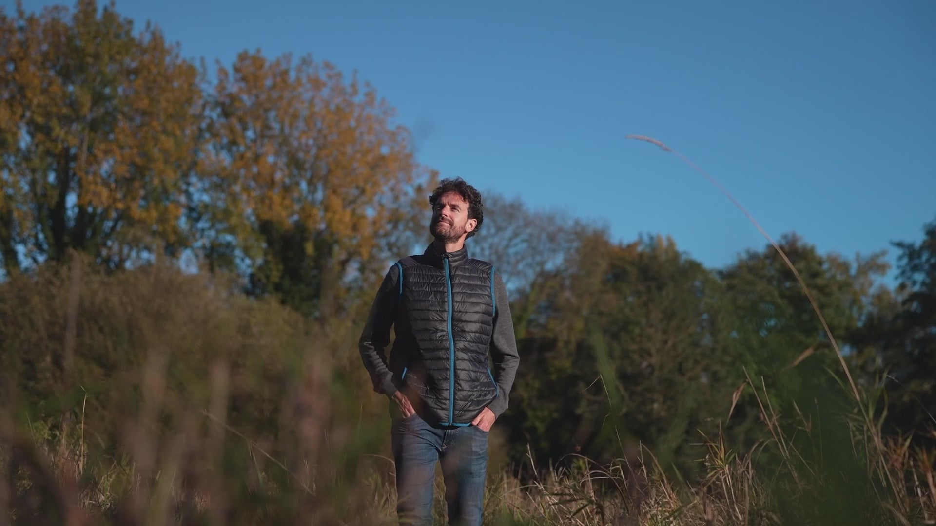 Isobaa | Mens Merino Wool Insulated Gilet (Black/Blue) | Fight the chill with our innovative Merino gilet. | align: 50% 65% | Model: Leighton
