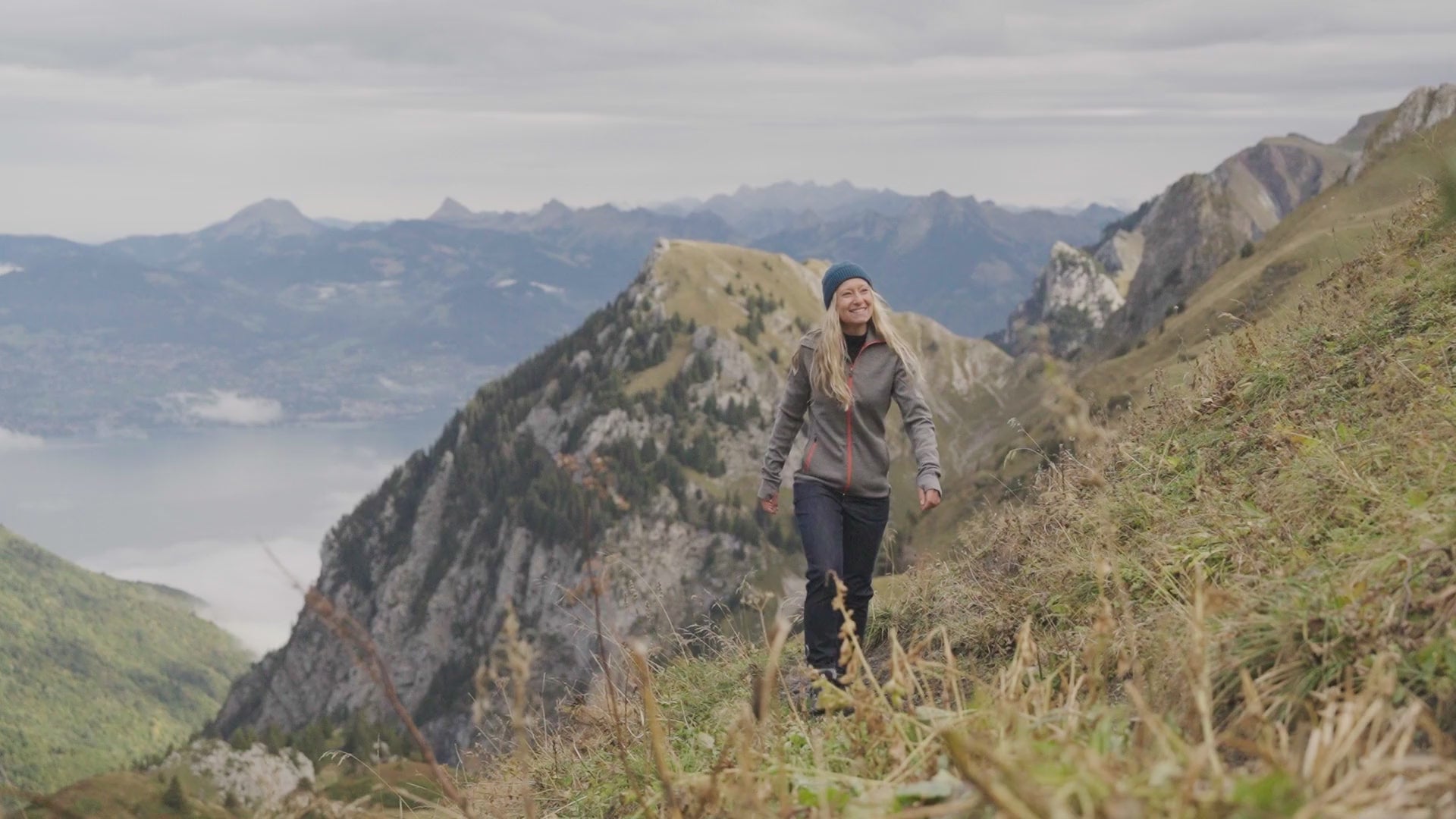 Isobaa | Womens 320 Merino Full Zip (Charcoal/Orange) | Step into a new level of comfort and versatility with our 320 Merino Full Zip Jacket | align: 60% 60% | Model: Estelle