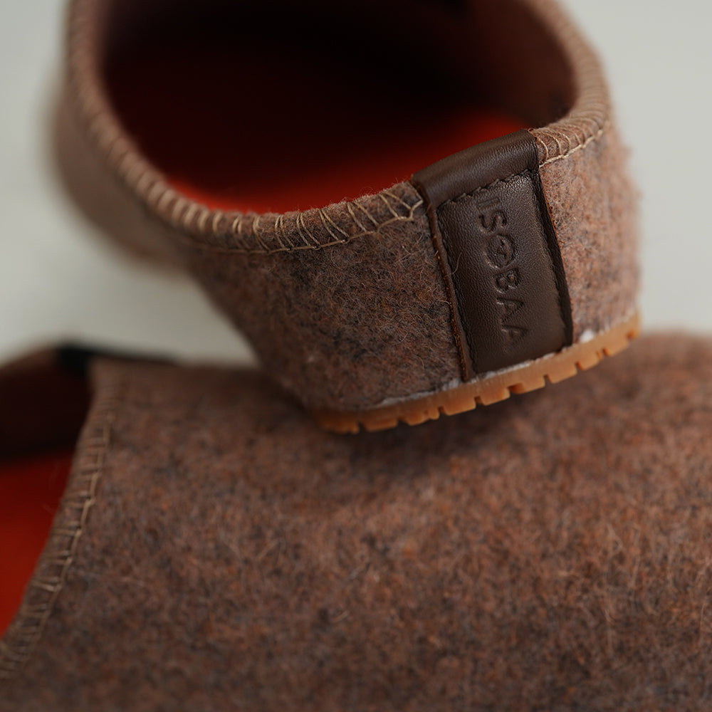Isobaa | Merino Wool Blend Slippers (Bran/Orange) | Comfort that lasts – Isobaa's Merino blend slippers are your companions for relaxation both indoors and out.