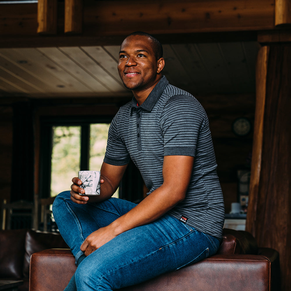Isobaa | Mens Merino 180 Short Sleeve Polo Shirt (Stripe Smoke/Charcoal) | The ultimate Merino wool polo  – perfect for weekend hikes, bike commutes, post-adventure coffee stops, office days, and everything in-between. | Model: Edirin