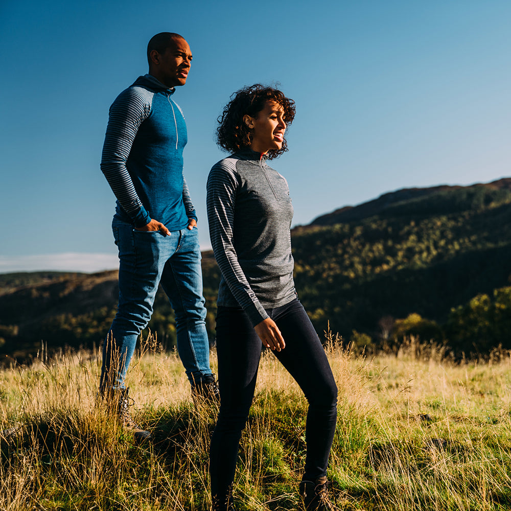 Isobaa | Womens Merino 200 Long Sleeve Zip Neck (Stripe Smoke/Charcoal) | Experience the best of 200gm Merino wool with this ultimate half-zip top – your go-to for challenging hikes, chilly bike commutes, post-workout layering, and unpredictable weather. | Model: Micah