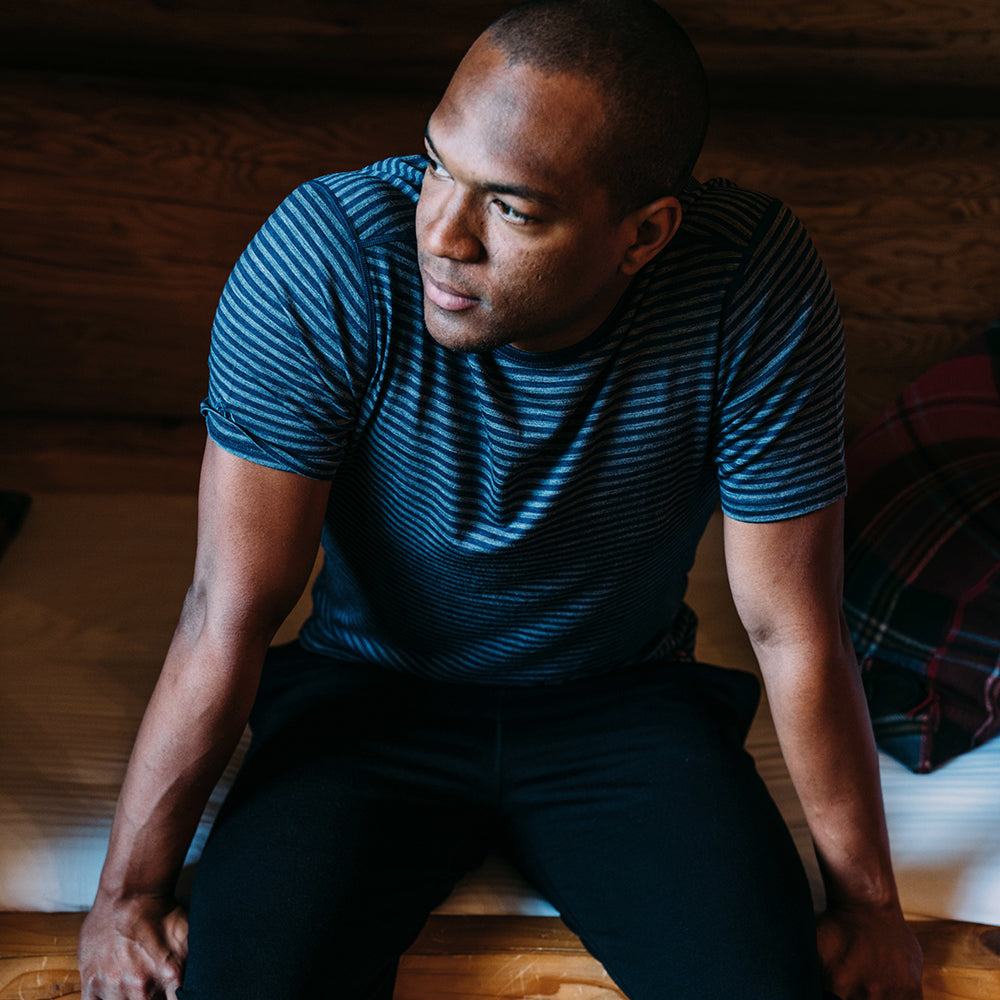 Isobaa | Mens Merino 150 Short Sleeve Crew (Stripe Petrol/Charcoal) | Gear up for performance and comfort with Isobaa's technical Merino short-sleeved top. | Model: Edirin