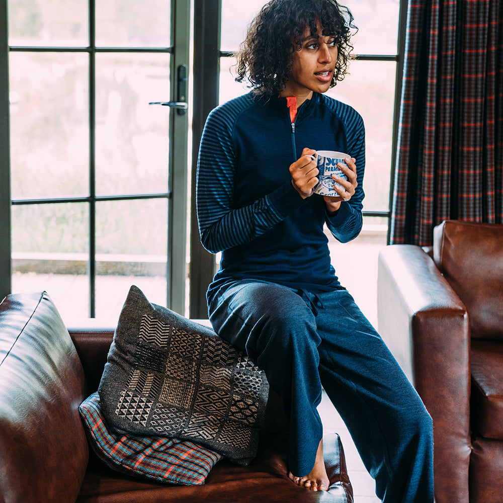 Isobaa | Womens Merino 200 Long Sleeve Zip Neck (Stripe Navy/Denim) | Experience the best of 200gm Merino wool with this ultimate half-zip top – your go-to for challenging hikes, chilly bike commutes, post-workout layering, and unpredictable weather. | Model: Micah