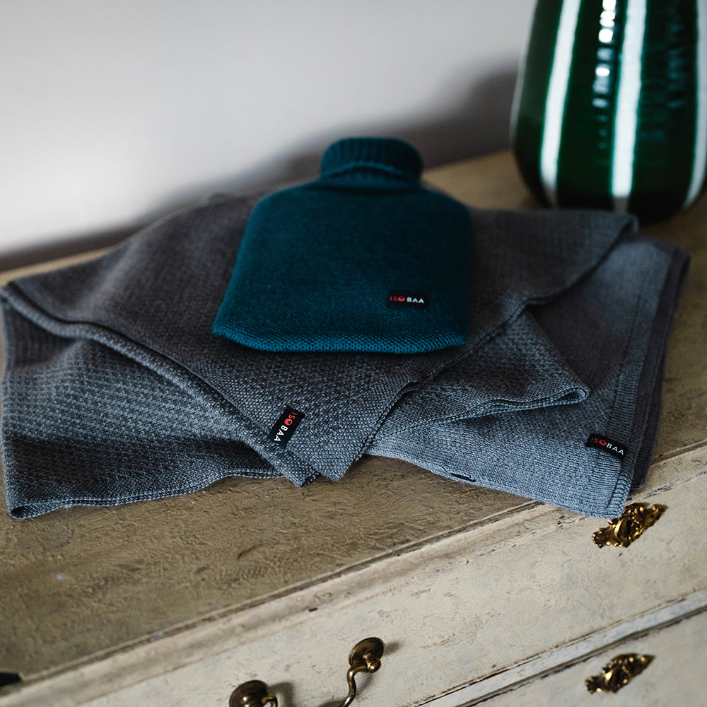 Isobaa | Merino Honeycomb Hot Water Bottle Cover (Petrol) | Give the gift of cosy warmth with Isobaa's Merino hot water bottle cover.