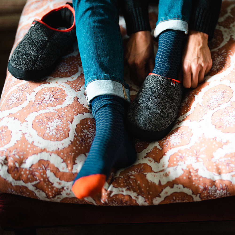 Isobaa | Merino Blend Travel Slippers (Black Melange) | Slip into ultimate comfort after a long day with Isobaa's Merino travel slippers.