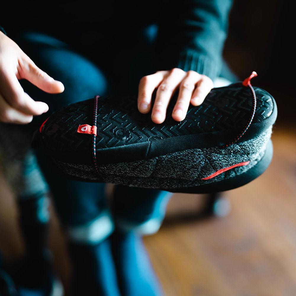 Isobaa | Merino Blend Travel Slippers (Black Melange) | Slip into ultimate comfort after a long day with Isobaa's Merino travel slippers.