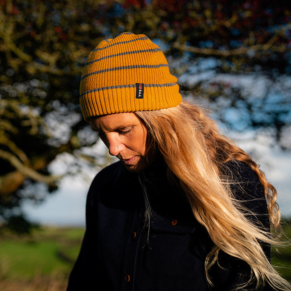 Isobaa | Merino Stripe Beanie (Mustard/Smoke) | Wrap yourself in cosy warmth with Isobaa's Merino beanie.