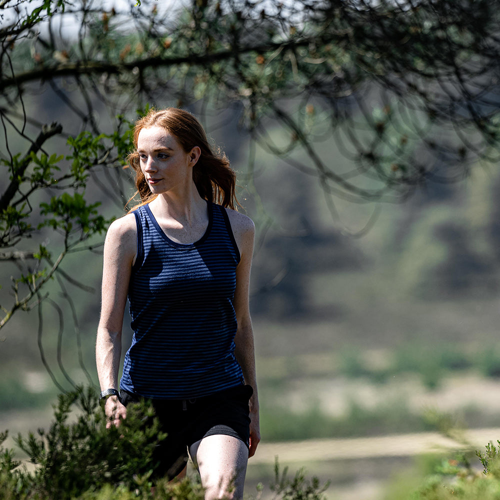 Isobaa | Womens Merino 150 Vest (Mini Stripe Navy/Denim) | Be ready for any adventure with Isobaa's superfine Merino sleeveless Vest. | Model: Sophie