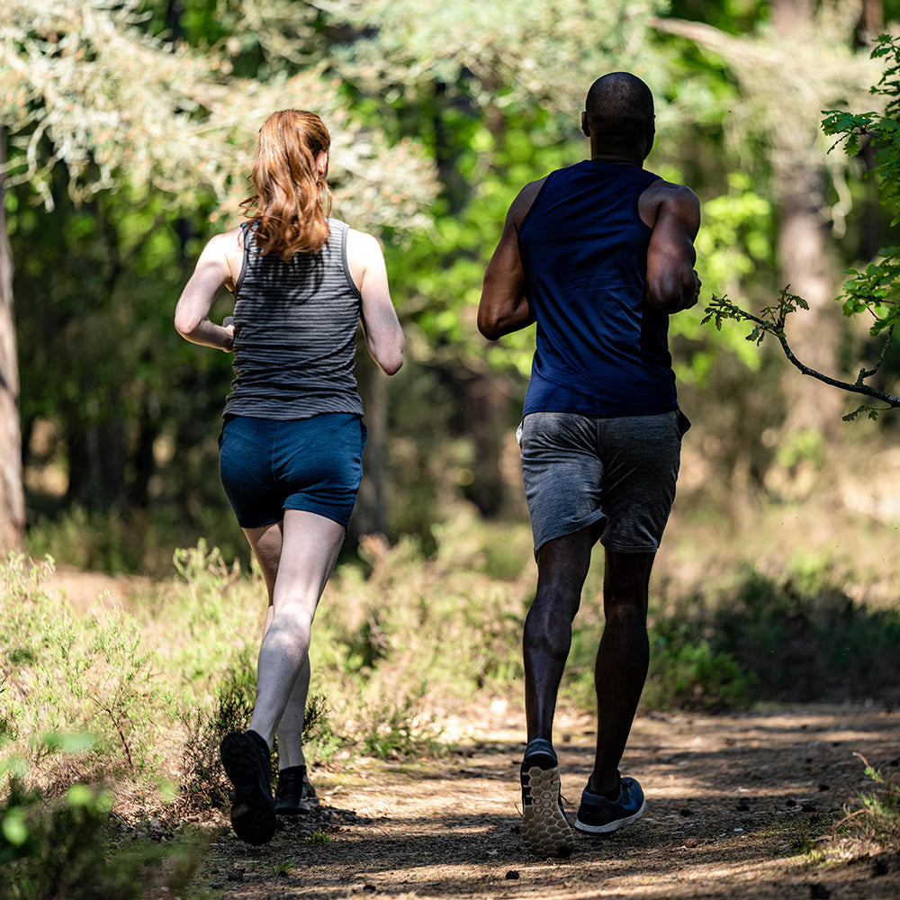 Isobaa | Womens Merino 150 Vest (Mini Stripe Smoke/Charcoal) | Be ready for any adventure with Isobaa's superfine Merino sleeveless Vest. | Model: Sophie