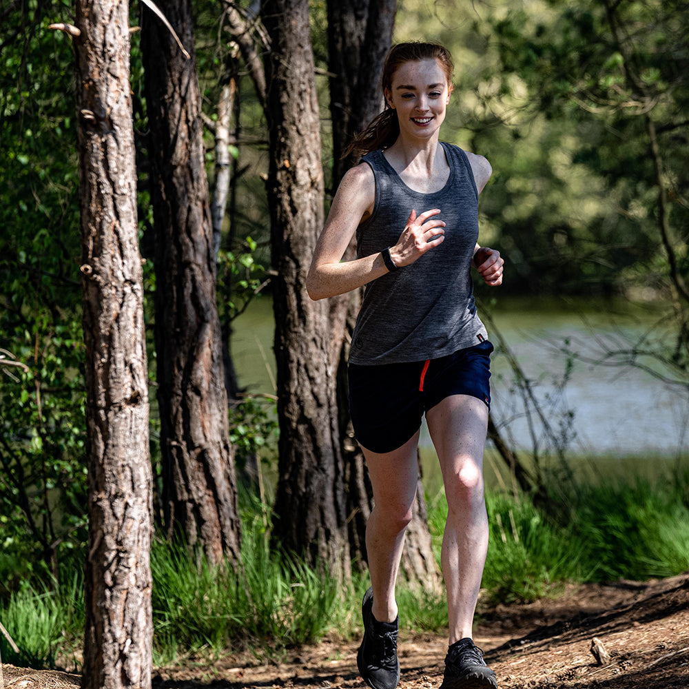 Isobaa | Womens Merino 150 Vest (Charcoal) | Be ready for any adventure with Isobaa's superfine Merino sleeveless Vest. | Model: Sophie