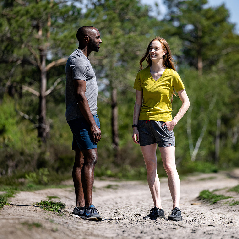 Isobaa | Mens Merino 150 V-Neck Tee (Charcoal) | Embark on new adventures with Isobaa's superfine Merino V-neck Tee. | Model: Michael