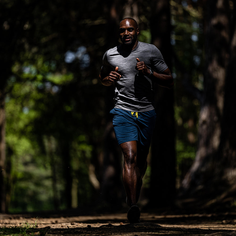 Isobaa | Mens Merino 150 V-Neck Tee (Charcoal) | Embark on new adventures with Isobaa's superfine Merino V-neck Tee. | Model: Michael