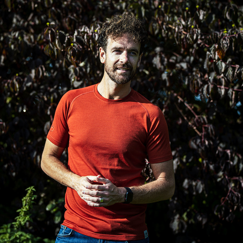Isobaa | Mens IsoSoft 180 Short Sleeve Crew (Burnt Orange) | Performance-driven Merino short-sleeved top. | Model: Leighton