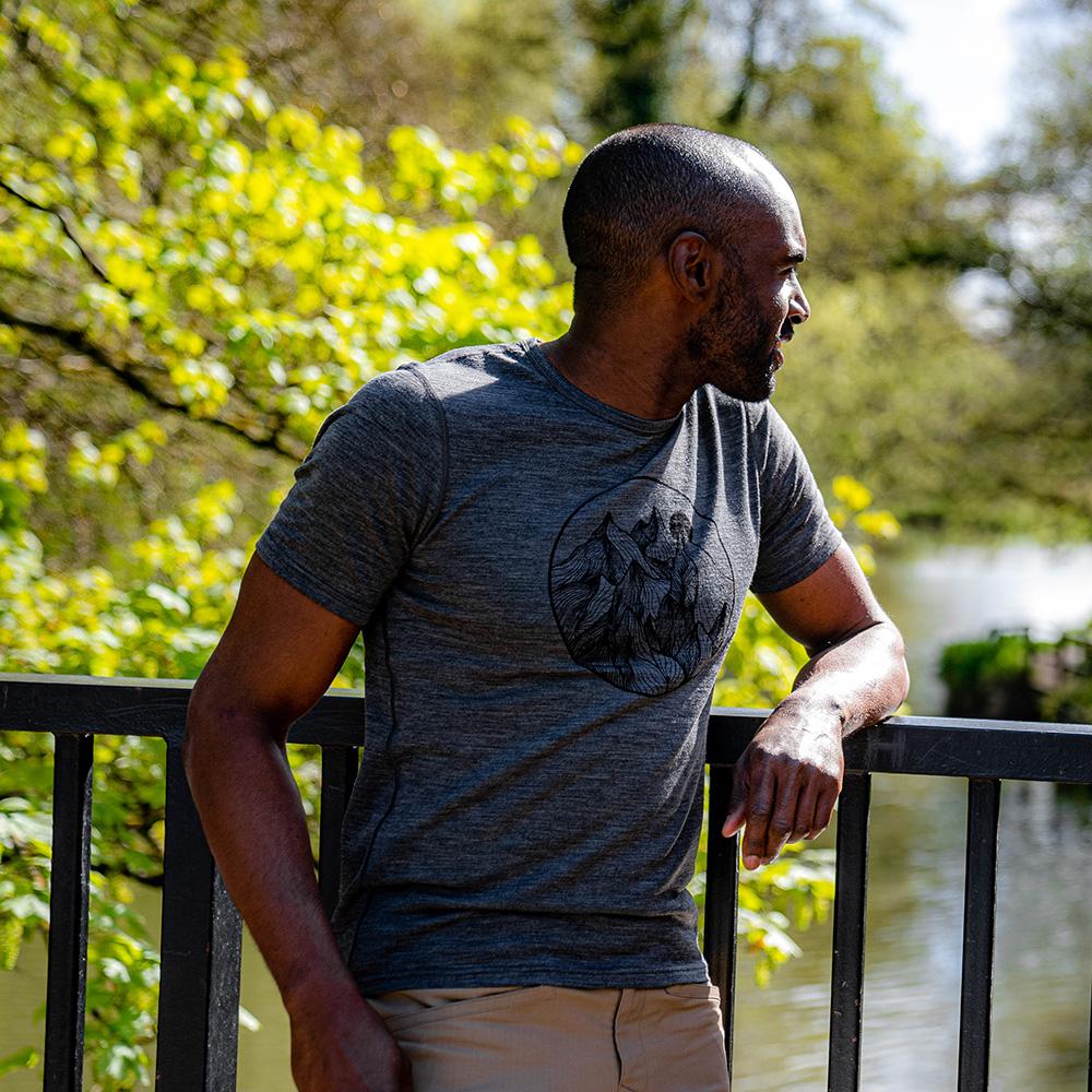 Isobaa | Mens Merino 150 Mountains Tee (Smoke) | Gear up for adventure with our superfine Merino Tee. | Model: Michael