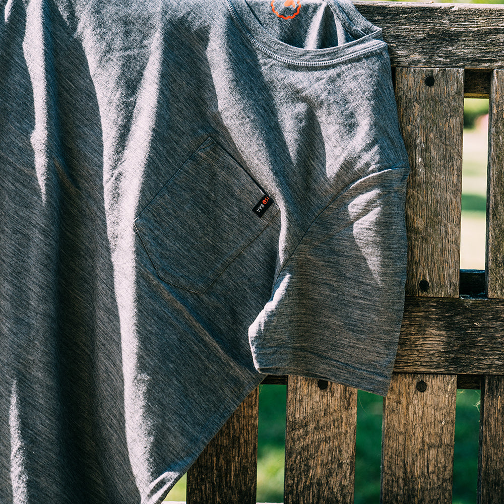 Isobaa | Mens Merino 150 Pocket Tee (Charcoal) | Gear up for outdoor adventure with Isobaa's superfine Merino Tee – a perfect blend of comfort, practicality, and sustainable design.