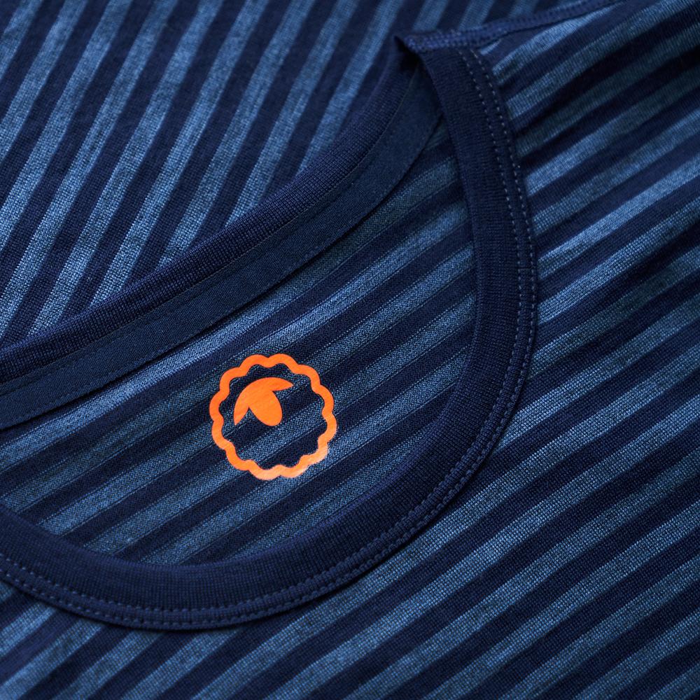 Isobaa | Mens Merino 150 Pocket Tee (Mini Stripe Navy/Denim) | Gear up for outdoor adventure with Isobaa's superfine Merino Tee – a perfect blend of comfort, practicality, and sustainable design.