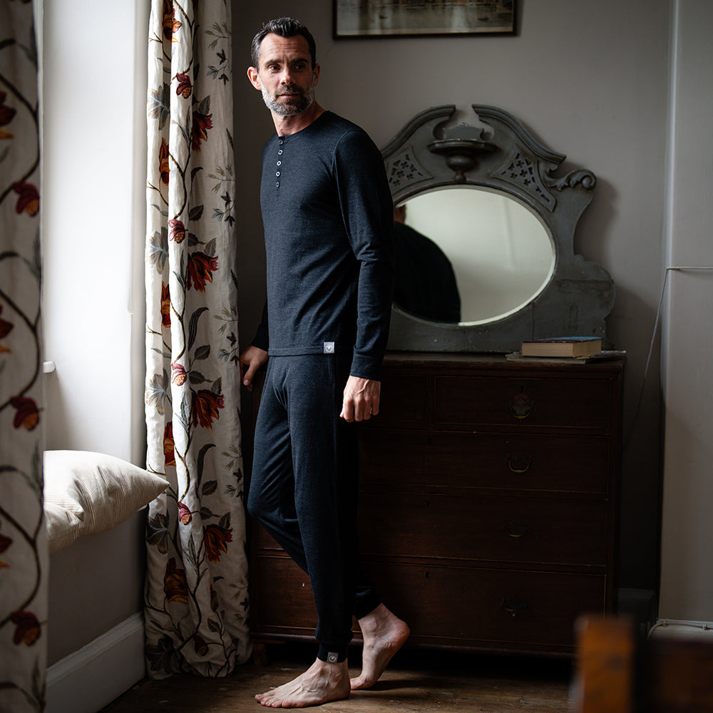 Isobaa | Mens Merino Blend 160 PJ Henley (Black Melange) | Relax with our superfine Merino blend Henley. | Model: Ben