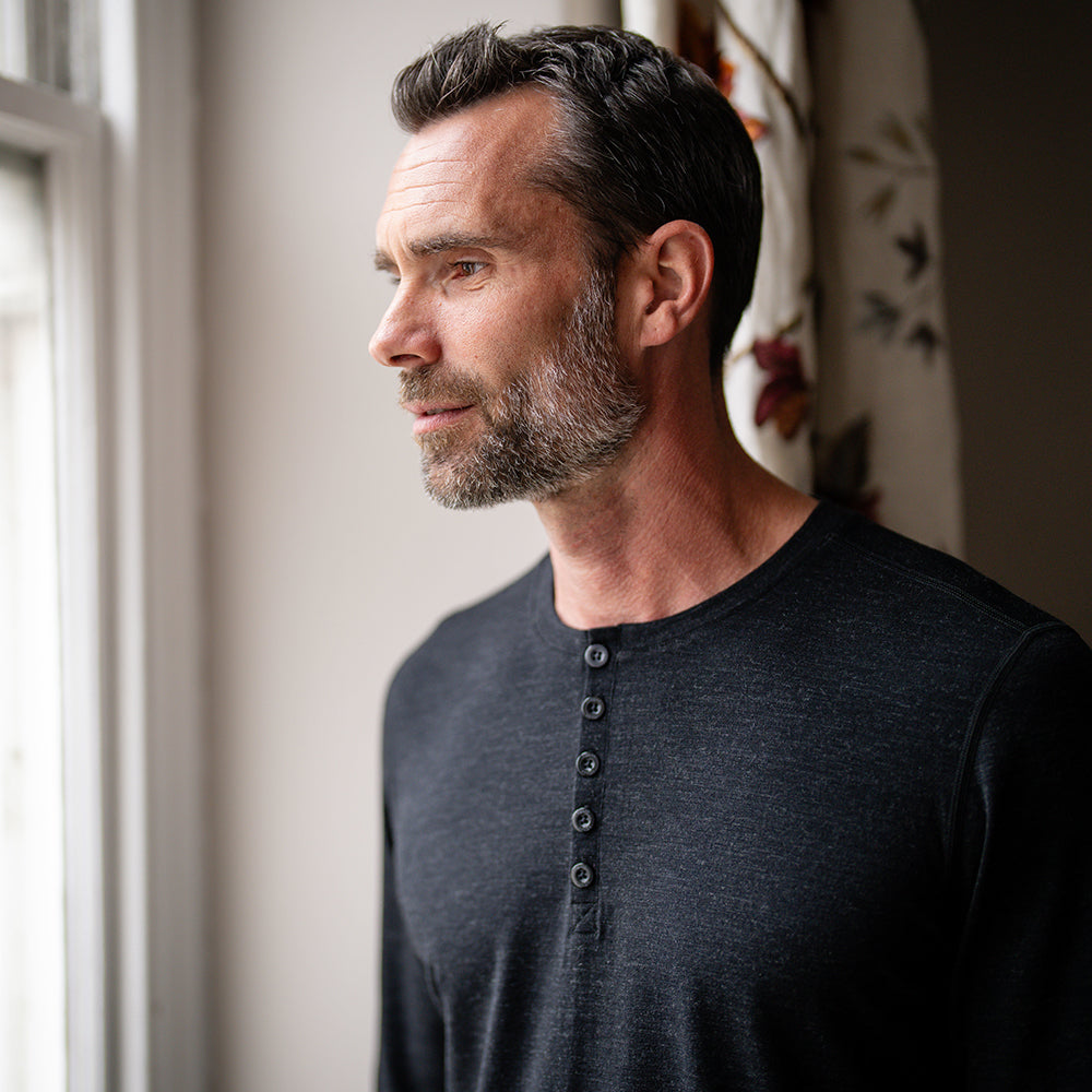 Isobaa | Mens Merino Blend 160 PJ Henley (Black Melange) | Relax with our superfine Merino blend Henley. | Model: Ben