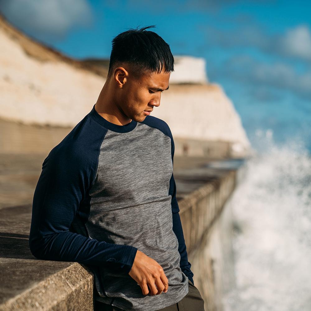 Isobaa | Mens Merino 180 Baseball Crew (Charcoal/Navy) | Experience the power of Merino wool with this ultimate outdoor base layer. | Model: Donald
