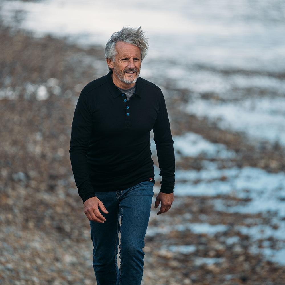 Isobaa | Mens Merino 200 Long Sleeve Polo Shirt (Black/Blue) | Discover unmatched comfort with our 200gm Merino wool polo. | Model: Simon
