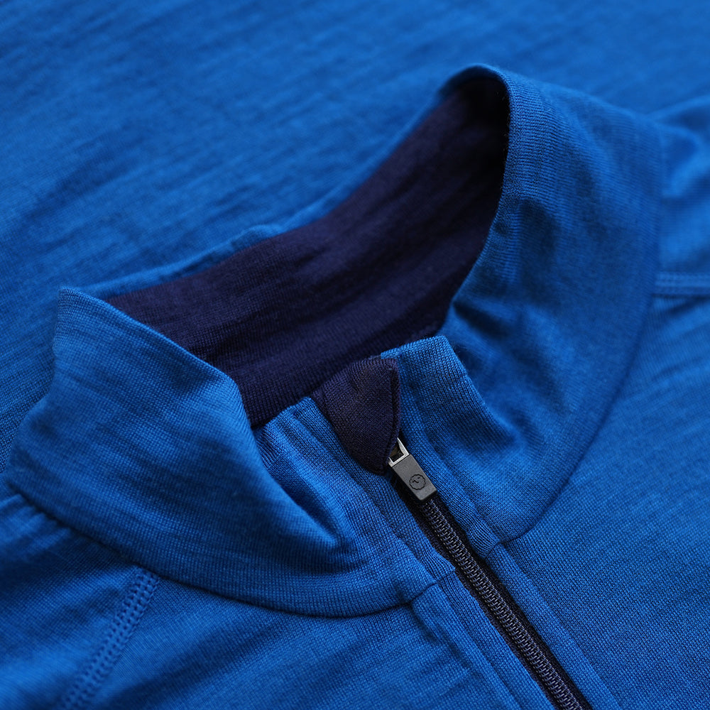 Isobaa | Mens Merino 200 Long Sleeve Zip Neck (Blue) | Experience the best of 200gm Merino wool with this ultimate half-zip top – your go-to for challenging hikes, chilly bike commutes, post-workout layering, and unpredictable weather.