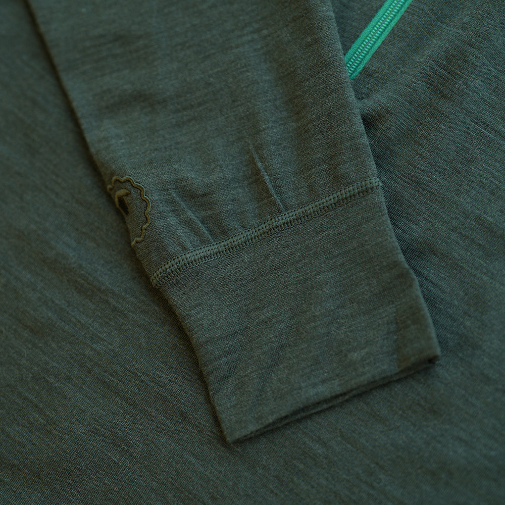 Isobaa | Mens Merino 200 Long Sleeve Zip Neck (Forest) | Experience the best of 200gm Merino wool with this ultimate half-zip top – your go-to for challenging hikes, chilly bike commutes, post-workout layering, and unpredictable weather.