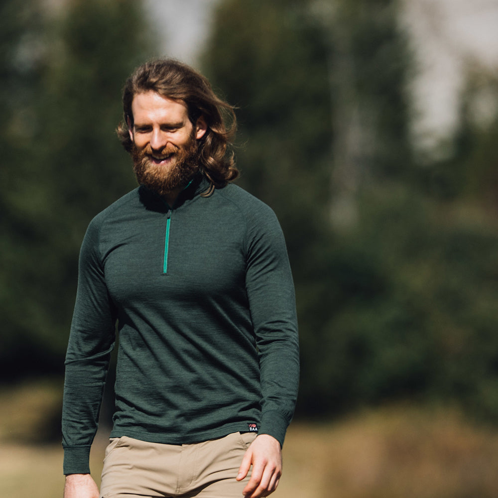 Isobaa | Mens Merino 200 Long Sleeve Zip Neck (Forest) | Experience the best of 200gm Merino wool with this ultimate half-zip top – your go-to for challenging hikes, chilly bike commutes, post-workout layering, and unpredictable weather. | Model: Craig