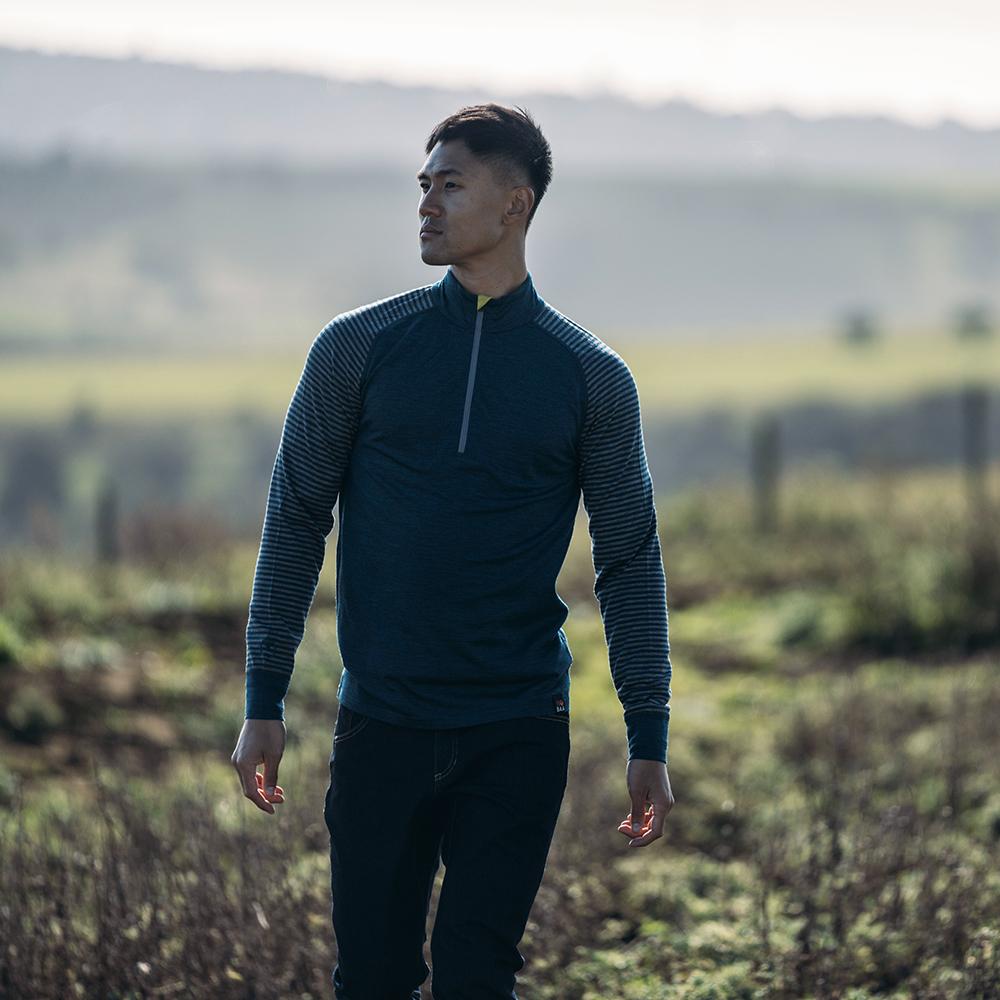 Isobaa | Mens Merino 200 Long Sleeve Zip Neck (Petrol/Charcoal) | Experience the best of 200gm Merino wool with this ultimate half-zip top – your go-to for challenging hikes, chilly bike commutes, post-workout layering, and unpredictable weather. | Model: Donald