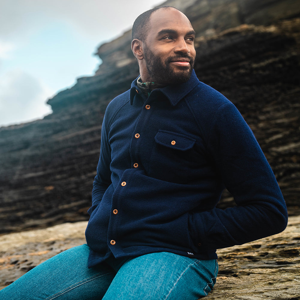 Isobaa | Mens Merino Blend Mountain Shirt (Navy) | Conquer trails, peaks, and urban adventures with this high-performance Merino blend overshirt. | Model: Michael