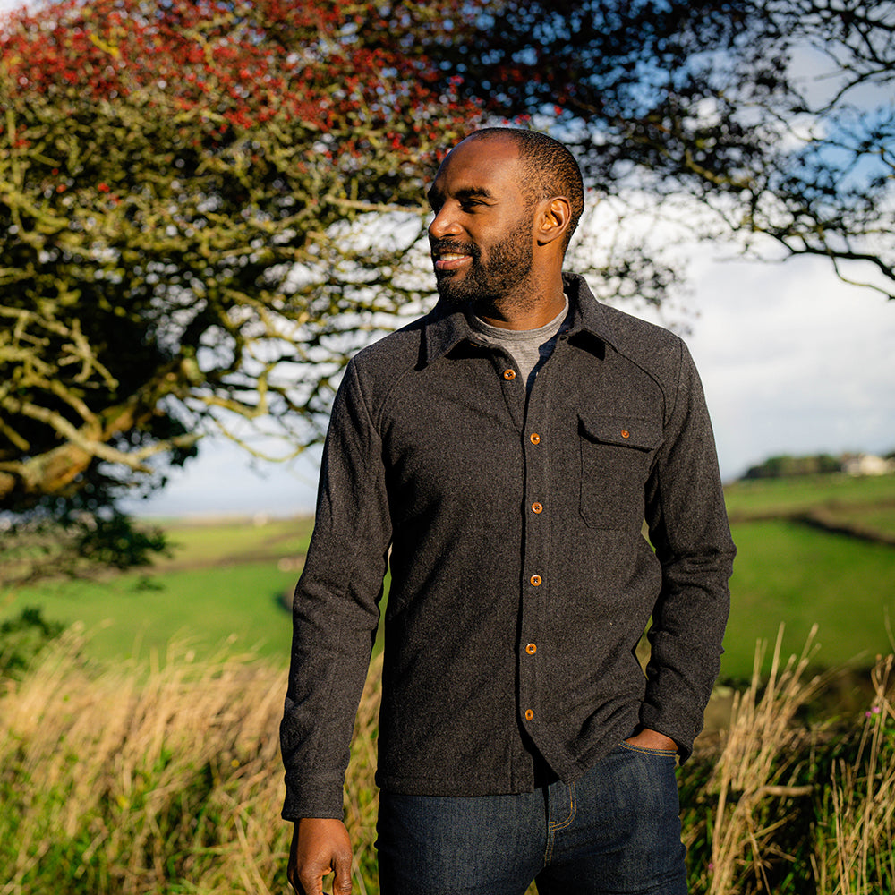 Isobaa | Mens Merino Blend Mountain Shirt (Smoke) | Conquer trails, peaks, and urban adventures with this high-performance Merino blend overshirt. | Model: Michael