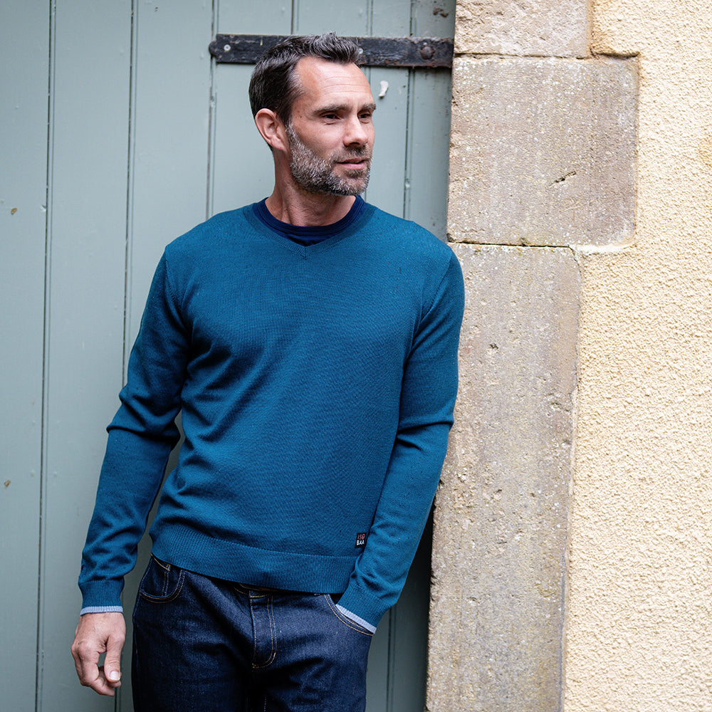 Isobaa | Mens Merino V Neck Sweater (Petrol/Sky) | Stay comfortable on the go with our V-neck sweater crafted from superfine Merino wool. | Model: Ben