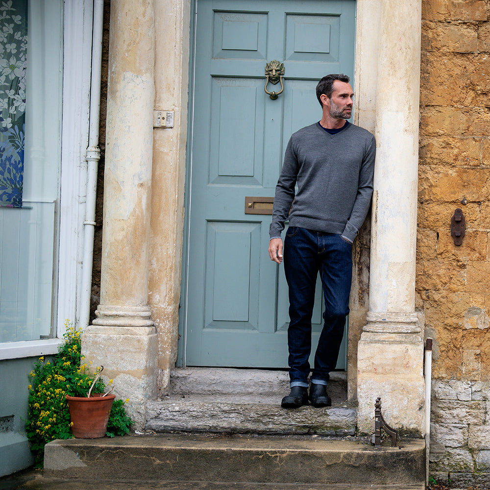 Isobaa | Mens Merino V Neck Sweater (Smoke/Charcoal) | Stay comfortable on the go with our V-neck sweater crafted from superfine Merino wool. | Model: Ben