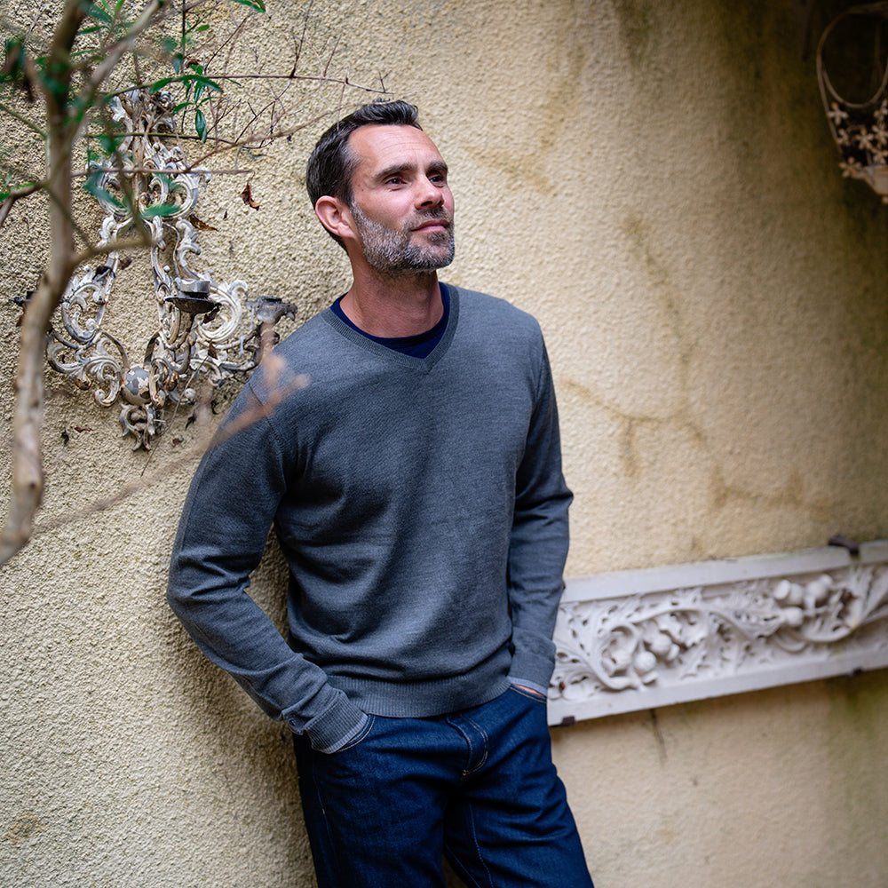 Isobaa | Mens Merino V Neck Sweater (Smoke/Charcoal) | Stay comfortable on the go with our V-neck sweater crafted from superfine Merino wool. | Model: Ben