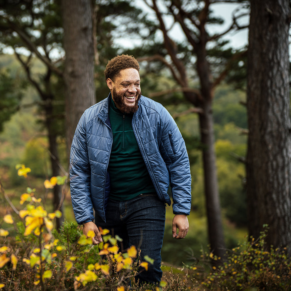 Isobaa | Mens Packable Insulated Jacket (Denim/Navy) | Exceptional warmth, packable convenience, and sustainable design with our lightweight Merino wool jacket. | Model: Shaquille