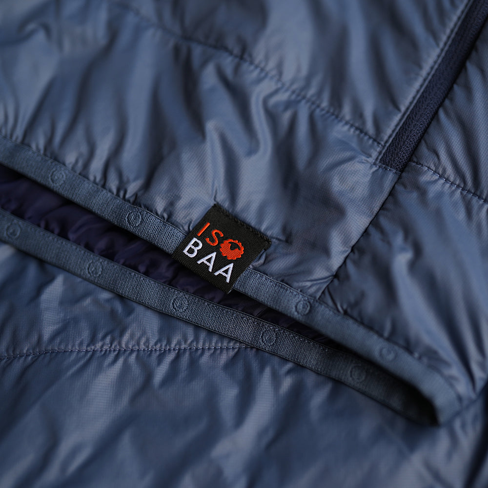 Isobaa | Mens Packable Insulated Jacket (Denim/Navy) | Exceptional warmth, packable convenience, and sustainable design with our lightweight Merino wool jacket.