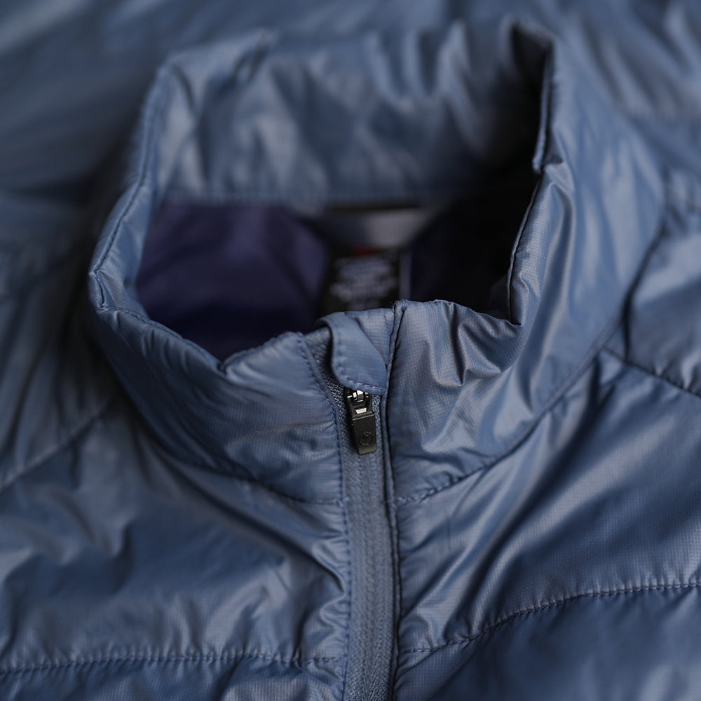 Isobaa | Mens Packable Insulated Jacket (Denim/Navy) | Exceptional warmth, packable convenience, and sustainable design with our lightweight Merino wool jacket.